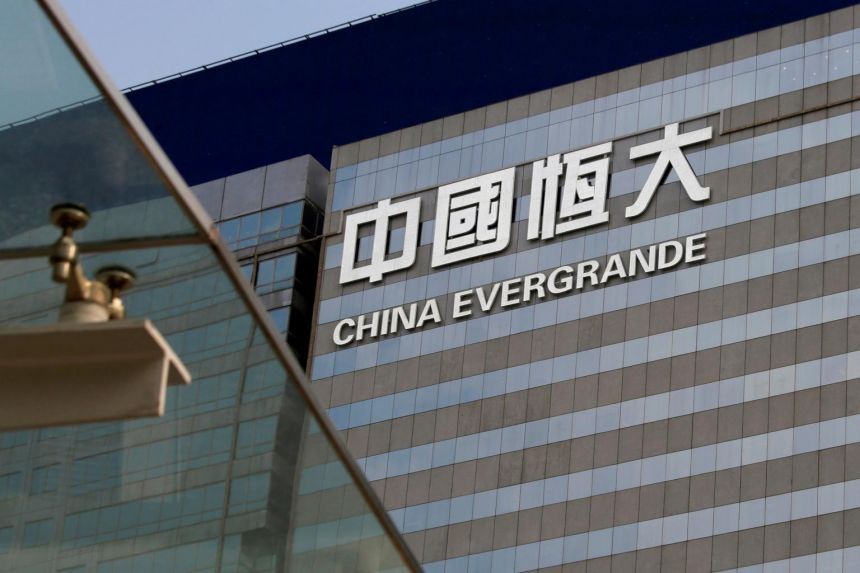 China Evergrande bonds halted; world&#39;s most indebted developer hit by fears  of cash crunch, Companies &amp; Markets News &amp; Top Stories - The Straits Times